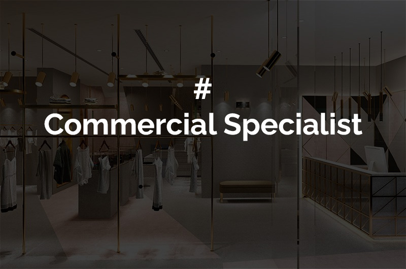 Modern clothing store interior with hashtag Commercial Specialist text